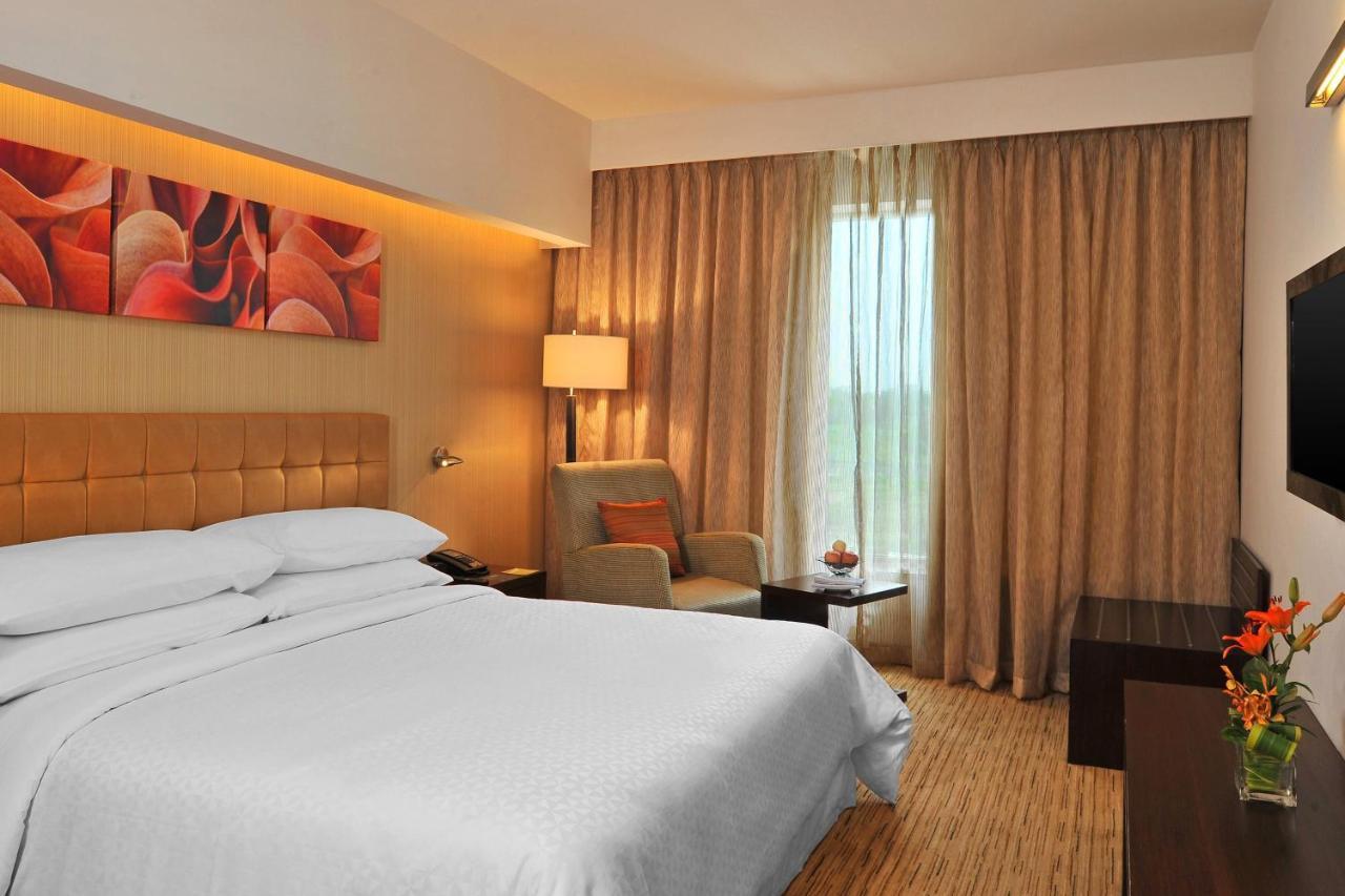 Four Points By Sheraton Hotel And Serviced Apartments Púna Kültér fotó