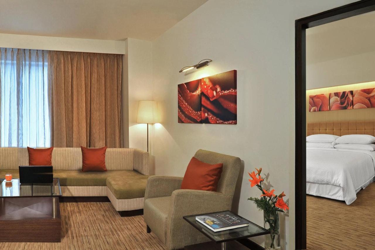 Four Points By Sheraton Hotel And Serviced Apartments Púna Kültér fotó