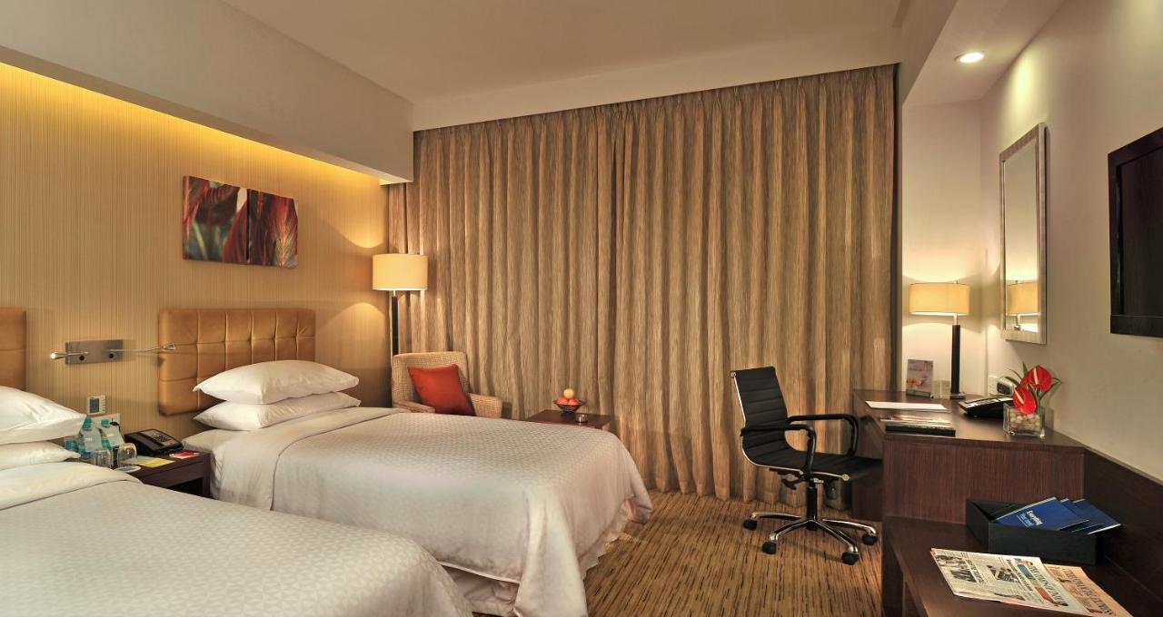 Four Points By Sheraton Hotel And Serviced Apartments Púna Kültér fotó